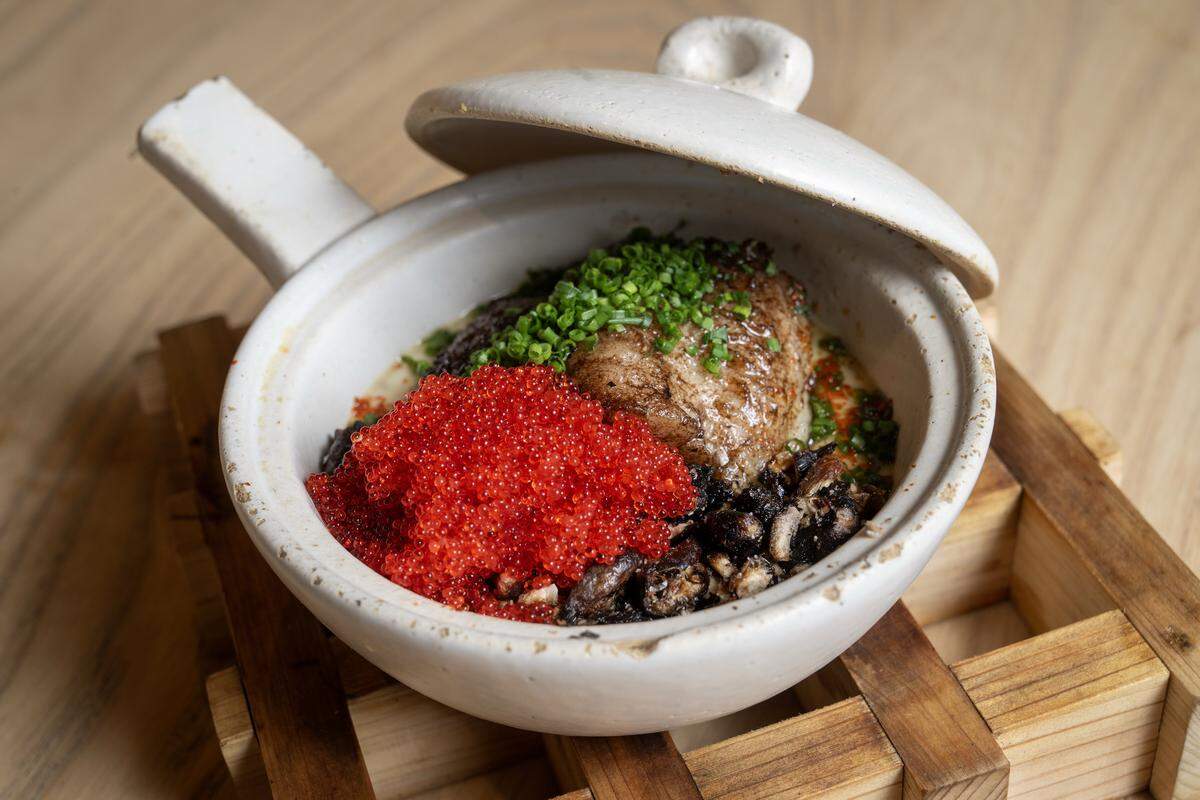 Chawanmushi, a dish featuring Missouri catfish, black olive oil, trout roe, chives, and fried heirloom corn, at Anjin, a 20-seat Japanese Izakayas-style restaurant, on Monday, March 16, 2026, in Kansas City.