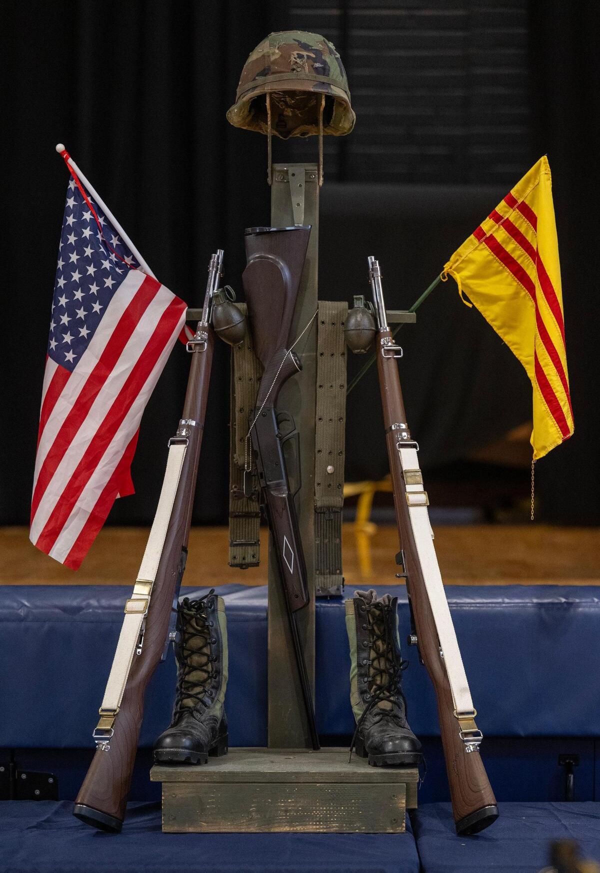 A Battlefield Cross, a symbolic memorial used by military personnel to honor fallen comrades displayed flags of the United States and of South Vietnam during “Remembering Saigon.”