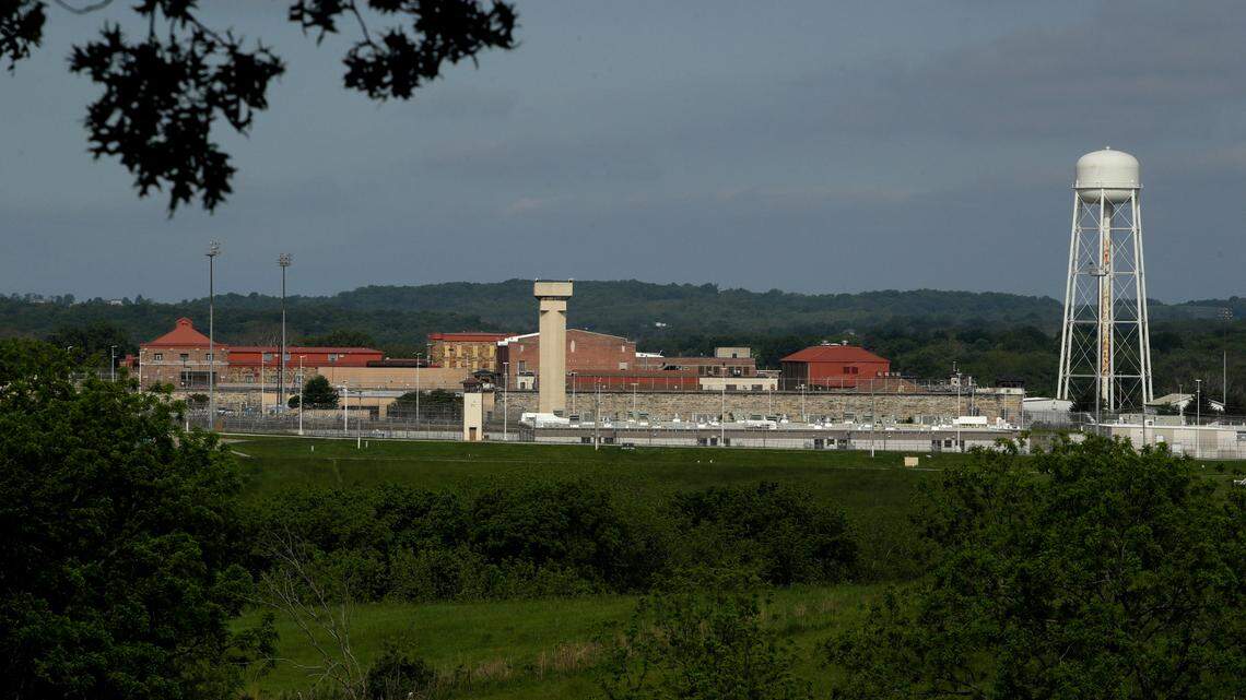 The Lansing Correctional Facility is seen in this photo taken Saturday, May 23, 2020 in Lansing, Kan. As of May 22, the prison has recorded 817 prisoners and 96 staff that have tested positive for COVID-19. (AP Photo/Charlie Riedel)