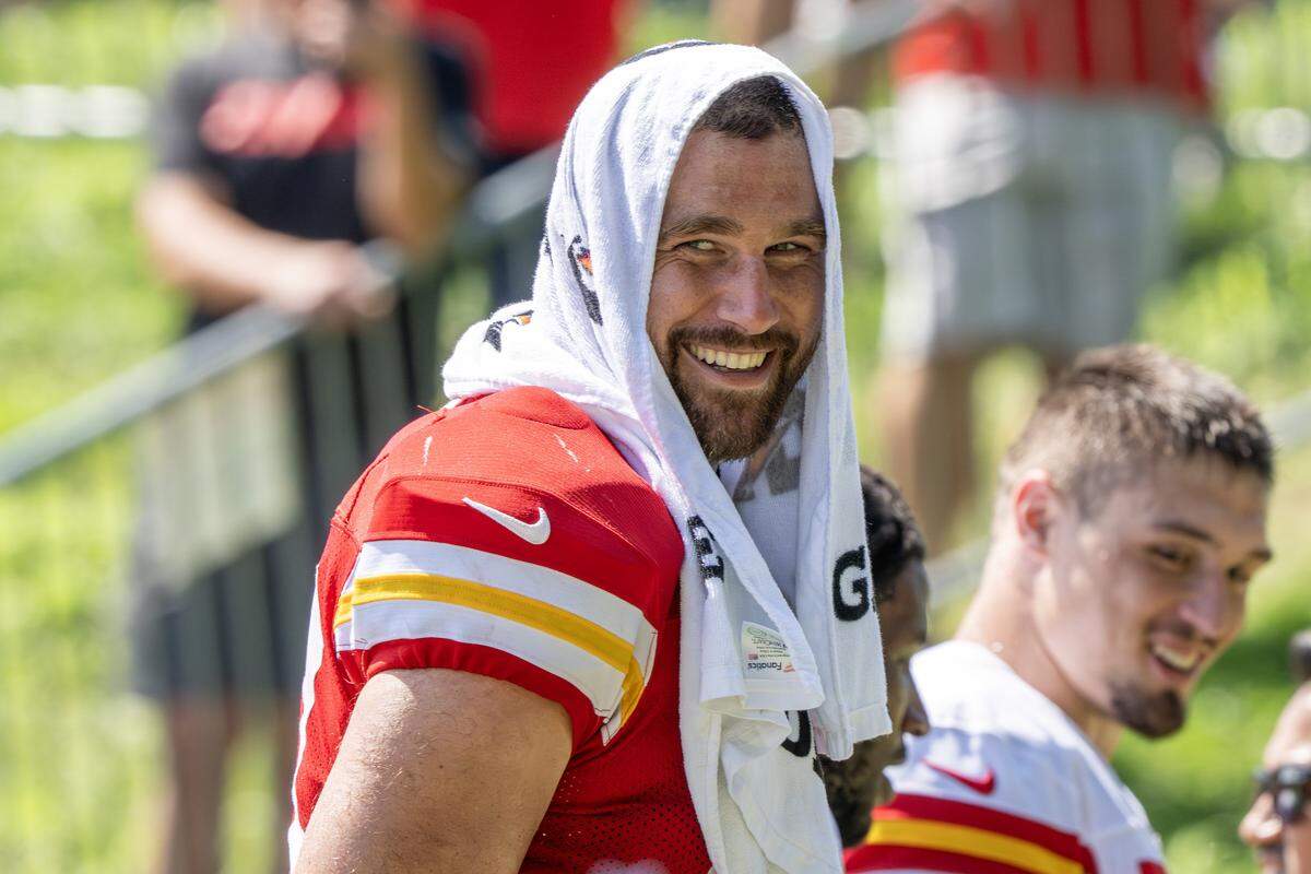 Kansas City Chiefs tight end Travis Kelce (87) smiles while walking off the field after Chiefs camp practice at Missouri Western State University on Monday, July 28, 2025, in St. Joseph.