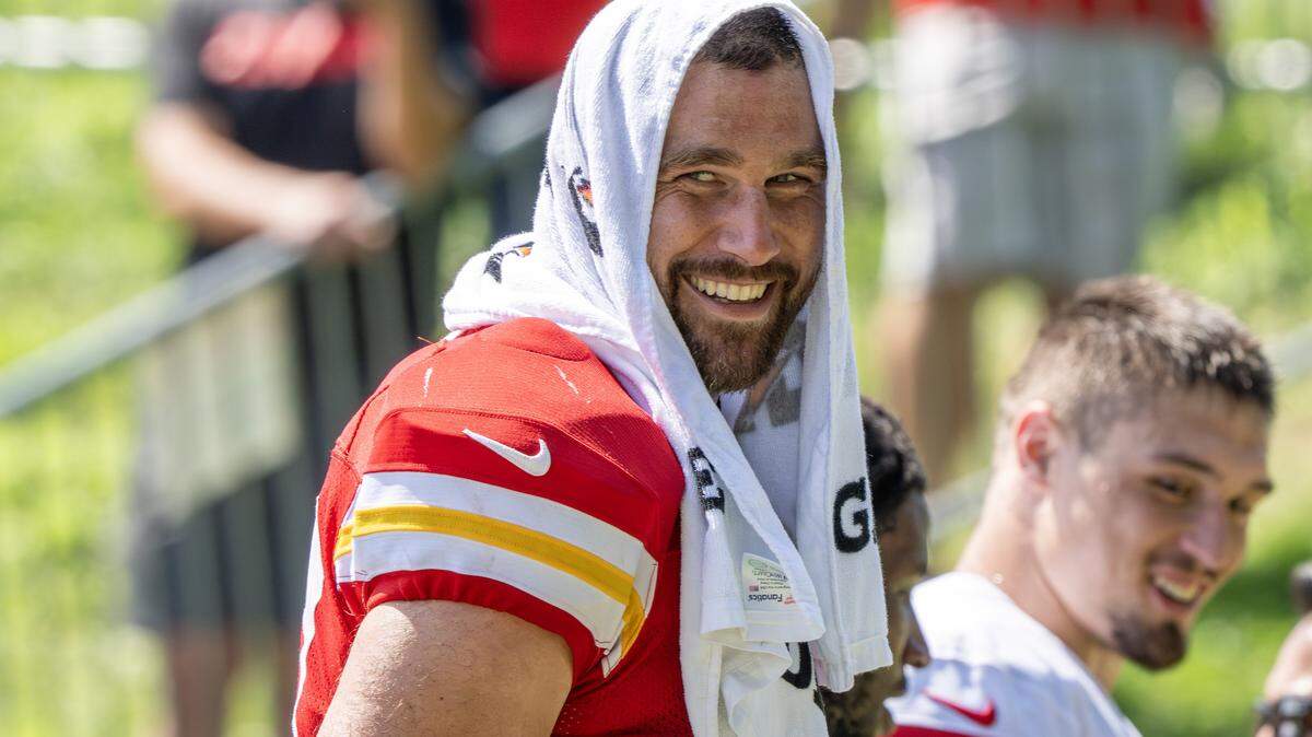 Kansas City Chiefs tight end Travis Kelce (87) smiles while walking off the field after Chiefs camp practice at Missouri Western State University on Monday, July 28, 2025, in St. Joseph.