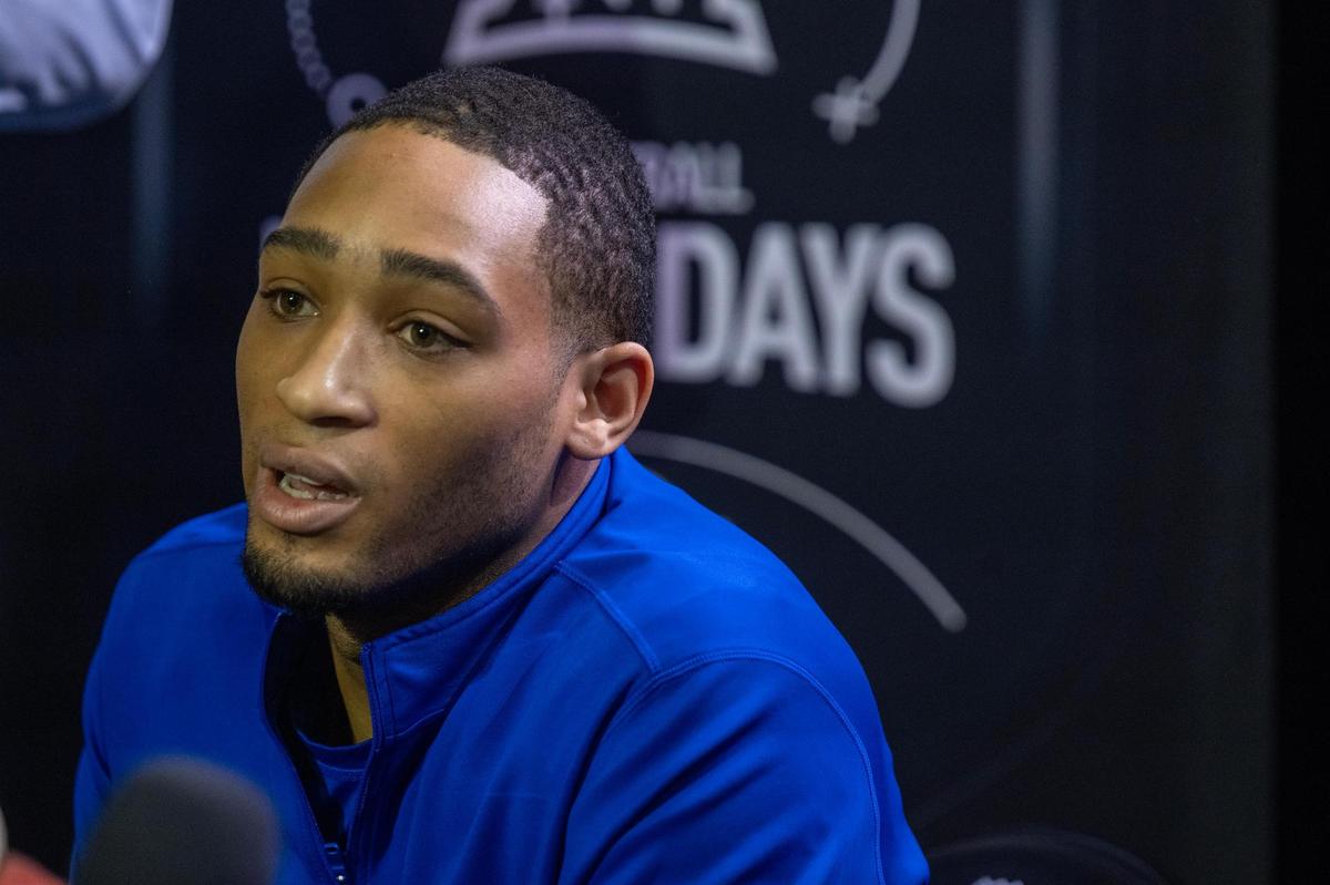 Kansas Jayhawks guard Dajuan Harris Jr. answers a question during Big 12 Men’s Basketball Media Day at T-Mobile Center on Wednesday, October 23, 2024.