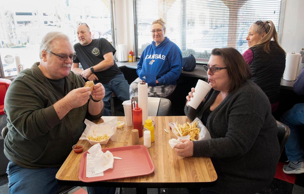 As others waited for their orders, Jon and Lynn Bumstead of Overland Park ate burgers and fries at The Snack Shack on Johnson Drive.