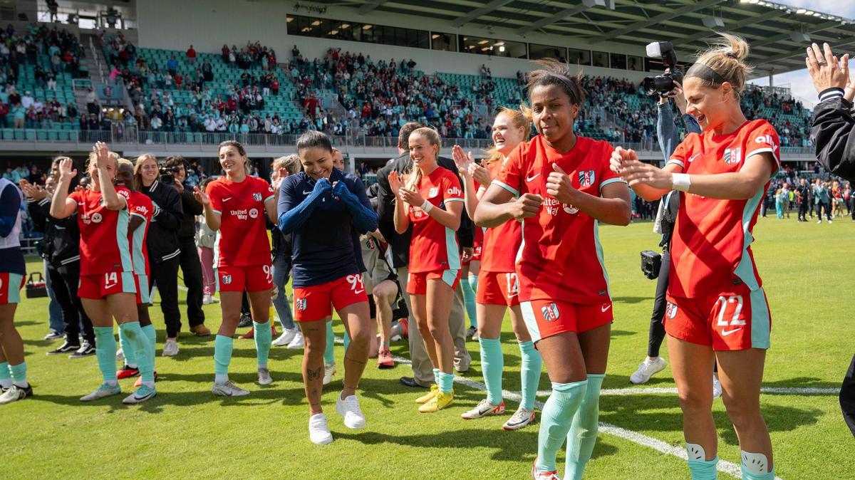 Members of the Kansas Current celebrated after they defeated the Portland Thorns, 5-4, in the home opener at the new CPKC Stadium on Saturday, March 16, 2024, in Kansas City.