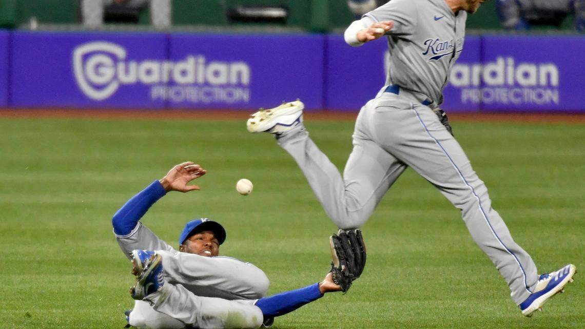 Kansas City Royals center fielder Michael A. Taylor can’t pull in a single by Pittsburgh Pirates pinch-hitter Wilmer Difo during the seventh inning of a baseball game Tuesday, April 27, 2021, in Pittsburgh. (Matt Freed/Pittsburgh Post-Gazette via AP)