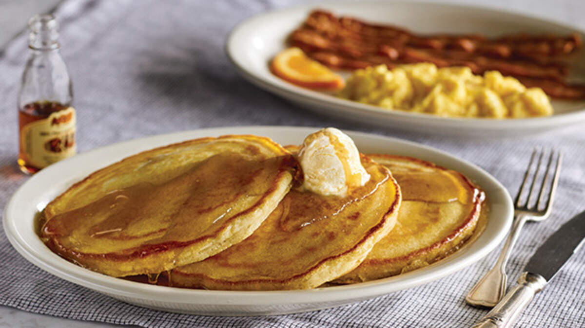 Cracker Barrel's "Momma's Pancake Breakfast" with three buttermilk pancakes served with 100 percent pure natural syrup and butter, along with two eggs and bacon or sausage.