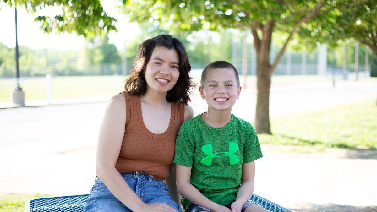 Annie Watson with her son Henry, 11, before track practice. Henry went through intensive tutoring to help him learn to read well after his original school didn’t provide the services he needed.