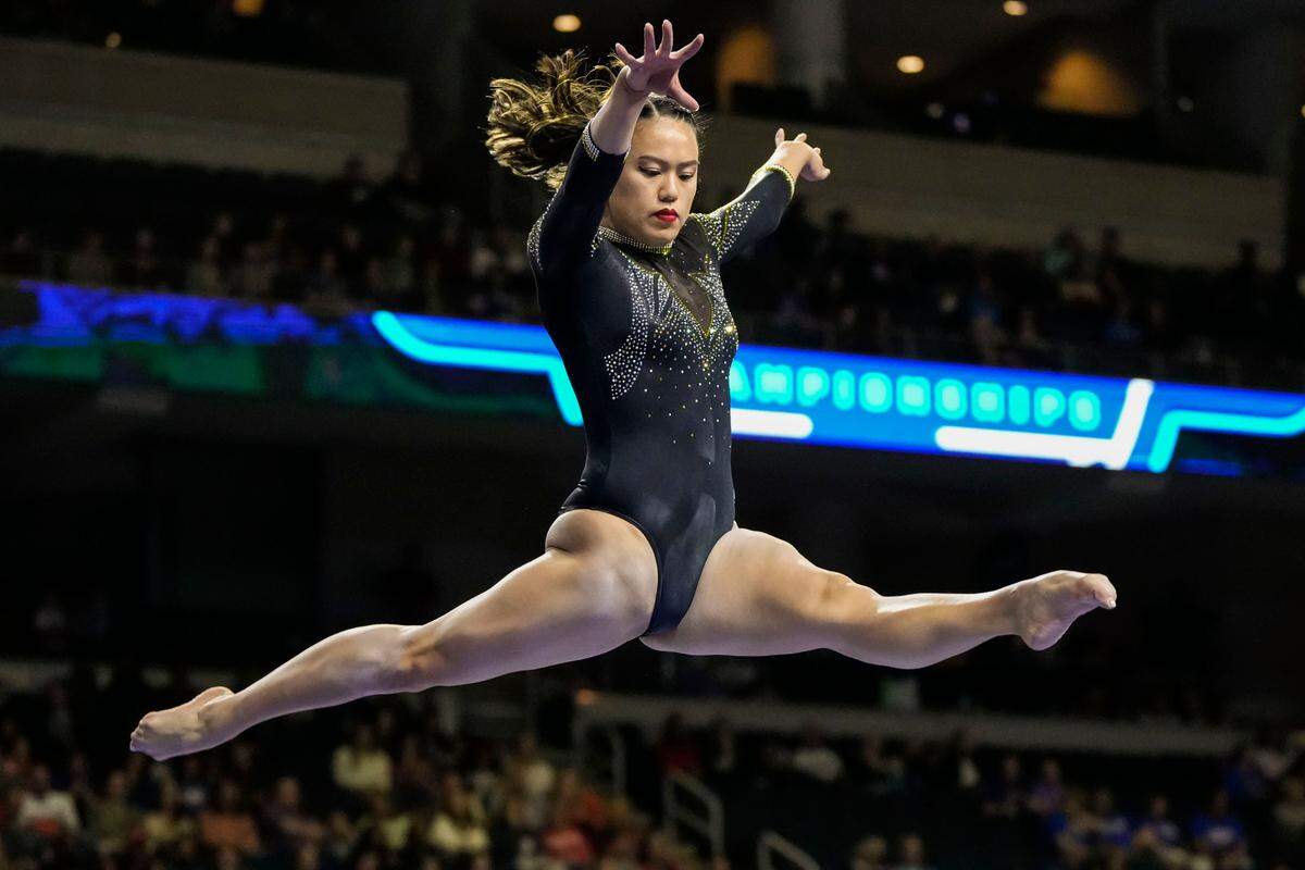 Missouri Tigers gymnast Helen Hu competes on the balance beam during the SEC Gymnastics Championship at Gas South Arena on March 18, 2023.