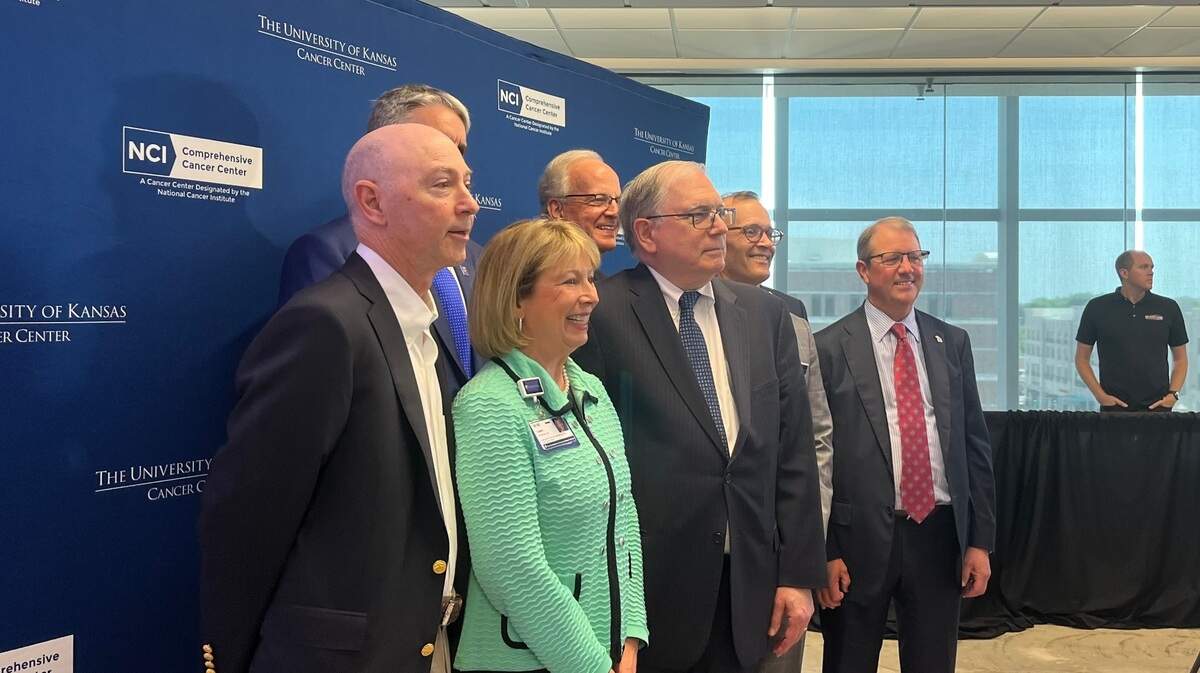 Charlie Sunderland, U.S. Sen. Jerry Moran, Acting Director of the National Institutes of Health Lawrence Tabak and leaders from the University of Kansas Health System celebrate funding for a new KU Cancer Center. 