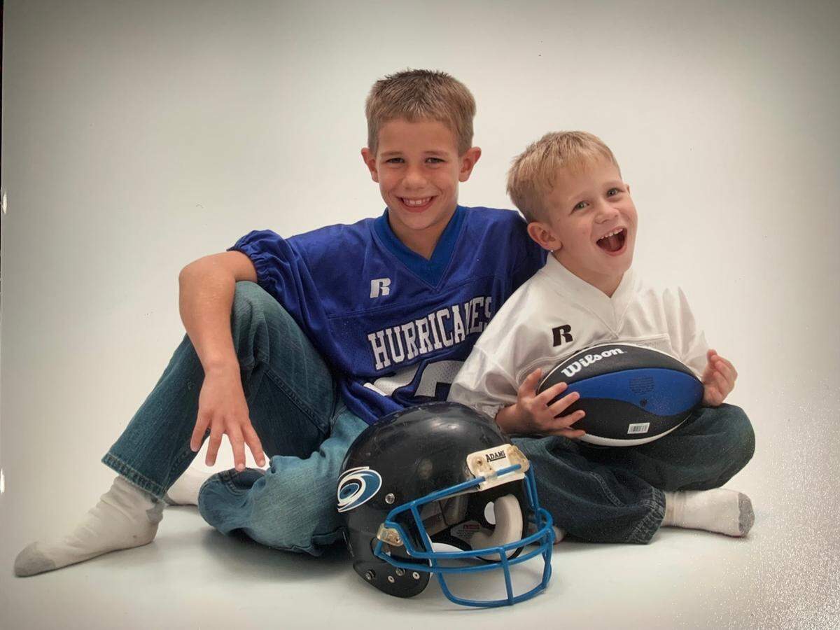 Dawson Herl (left) and Dayne Herl (right) as children. The two brothers have always been super competitive growing up, their dad Dale said, and will reunite at Missouri Southern in college this summer.