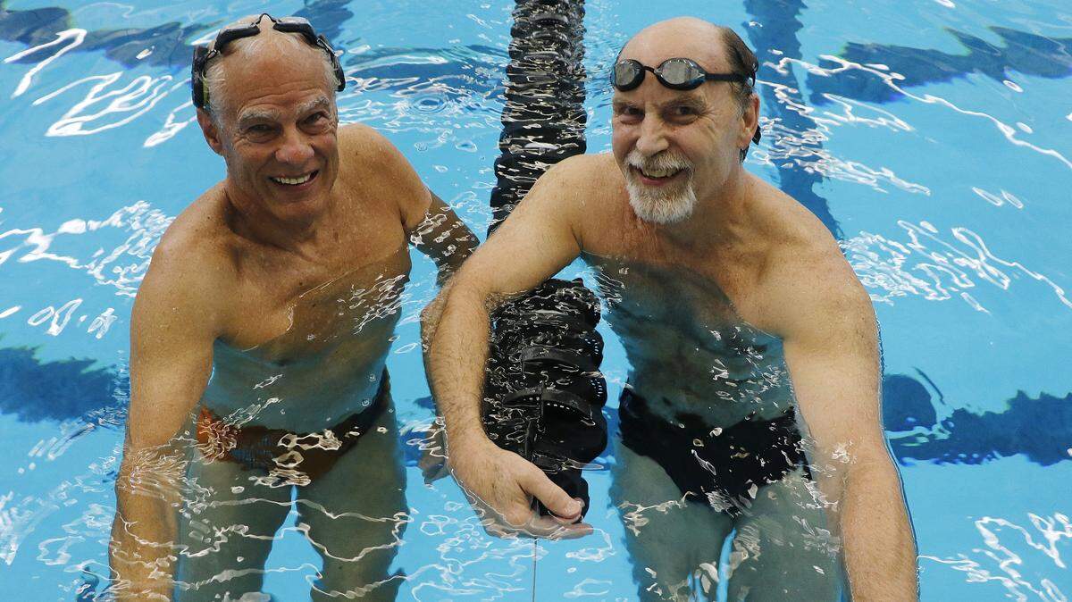 As friends and swimming partners since 2007, Dave Noble, left, and Richard Baldwin have cheered each other through gold-medal wins at swim competitions and supported one another through difficult times.