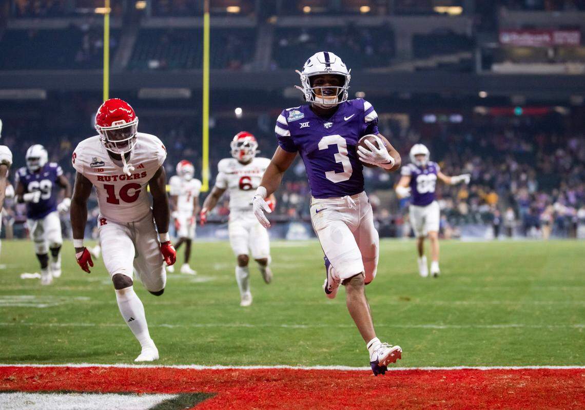Kansas State Wildcats running back Dylan Edwards (3) runs for a touchdown against the Rutgers Scarlet Knights during the second half of the Rate Bowl at Chase Field on Dec. 26, 2024.