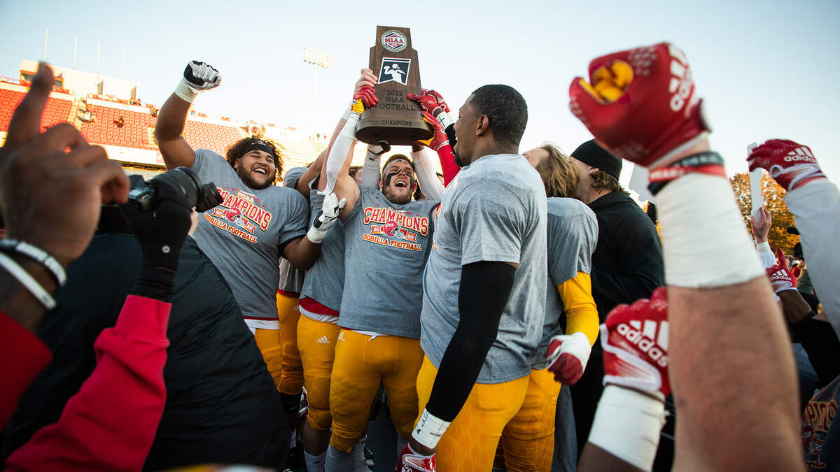Pittsburg State Gorillas players celebrate after capturing the 2022 MIAA Championship following an unblemished regular season. Pitt State defeated Fort Hays State 35-14 on Saturday to improve to 11-0.