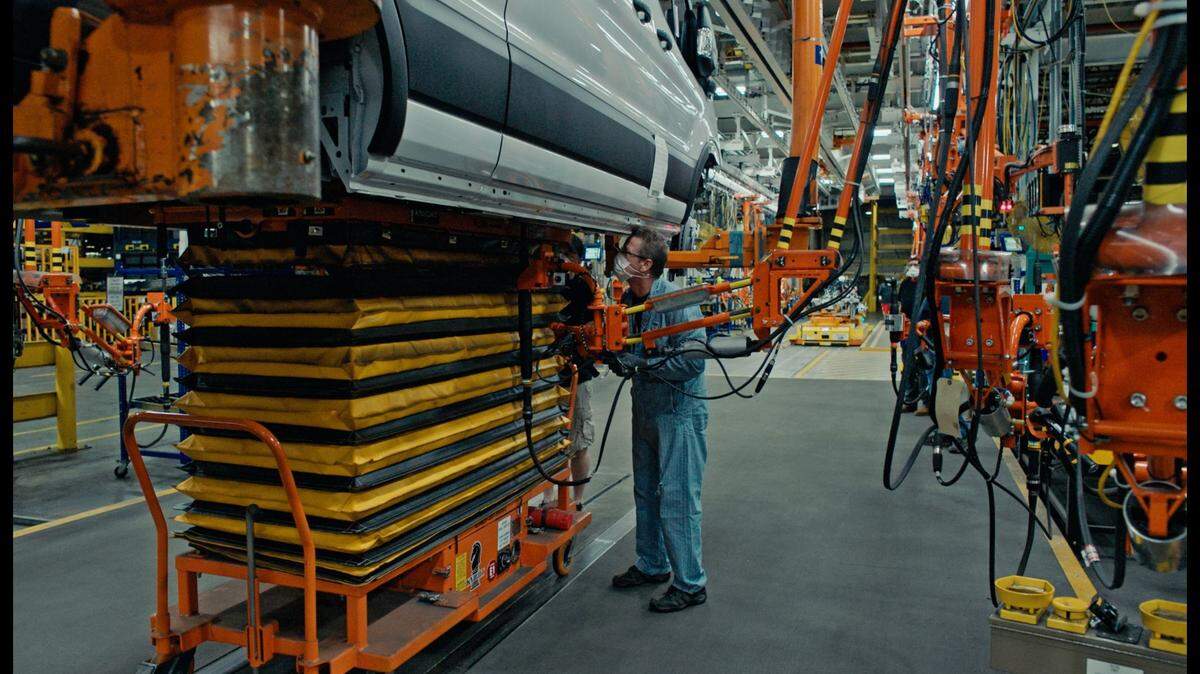An employee at Ford’s Kansas City Assembly Plant works on the E-Transit line, Ford’s second all-electric vehicle and the first electric model to be built in Kansas City.