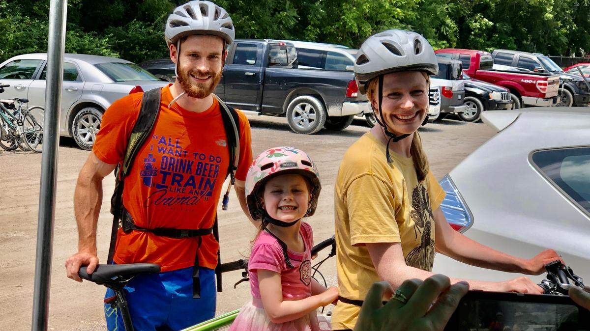 McKenzie and William Neds and their 4-year-old daughter, Aspen enjoy a stop at Crane Brewery. McKenzie was riding an electric bike.