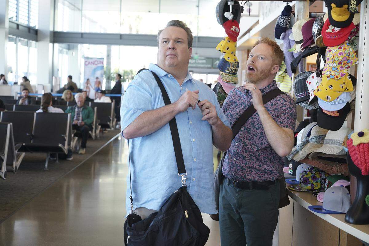 Mitch and Cam (Eric Stonestreet and Jesse Tyler Ferguson) have five minutes to catch a new flight while fighting the effects of sleeping pills they took prematurely. “There was no doubt that with Mitch and Cam it opened people’s eyes and minds and hearts to the idea that two men were just as qualified and just as unqualified to raise a child,” Stonestreet says.