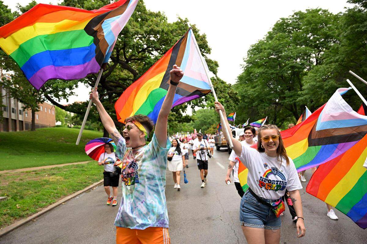 Maddie Anderson, left, and Jessi Carpenter celebrated during the KC Pride Parade as they marched with a group from SportingKC in 2002.