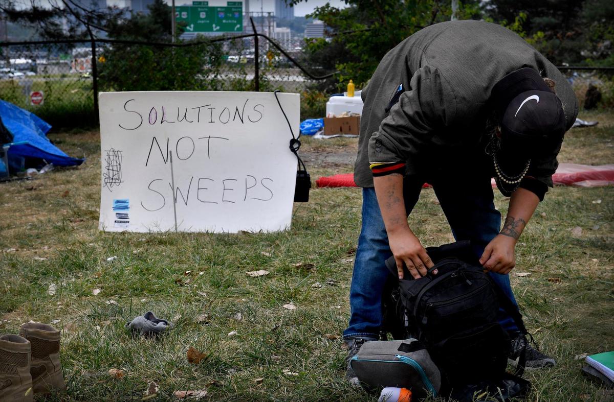 Andrew Taylor, who lives in the camp with his mother and brother, suffers from schizophrenia that requires medication that is sometimes difficult or impossible to get. On the day that Kansas City Parks & Recreation and KCPD swept the park near 10th Street and Harrison, Taylor got distressed while trying to gather his belongings as authorities moved a large front loader onto the property.