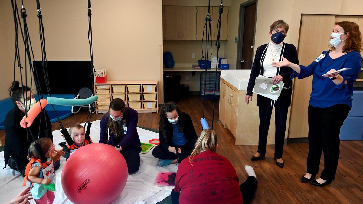 In this April 20 photo,Kansas Gov. Laura Kelly, second right, tours the B.E. Smith Family Center, on AdventHeatlh’s main campus.