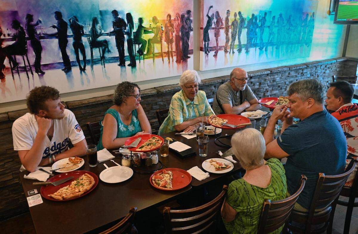 David Harris, second from right, celebrated his birthday with relatives last month at Minsky’s Pizza Cafe and Bar, 5105 Main St.