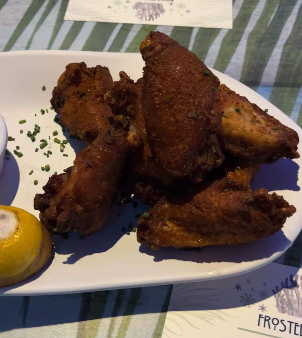 Old Bay wings: eight chicken wings tossed in Old Bay dry rub seasoning with a citrus aioli dip. It’s on the menu at The Frosted Reef, the holiday pop-up bar inside LandShark Bar & Grill, 1491 N 98th Terrace in Kansas City, Kansas