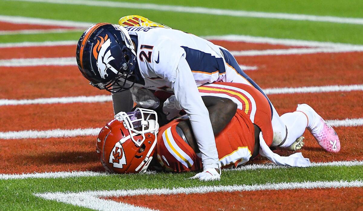 Kansas City Chiefs wide receiver Tyreek Hill battled Denver Broncos cornerback A.J. Bouye for what should have been called a touchdown reception in the second quarter Sunday, December 6, 2020, at Arrowhead Stadium in Kansas City, Missouri. Hill lost control of the ball but eventually came down with it but it was not called a touchdown by the referees and the Chiefs did not challenge the call.