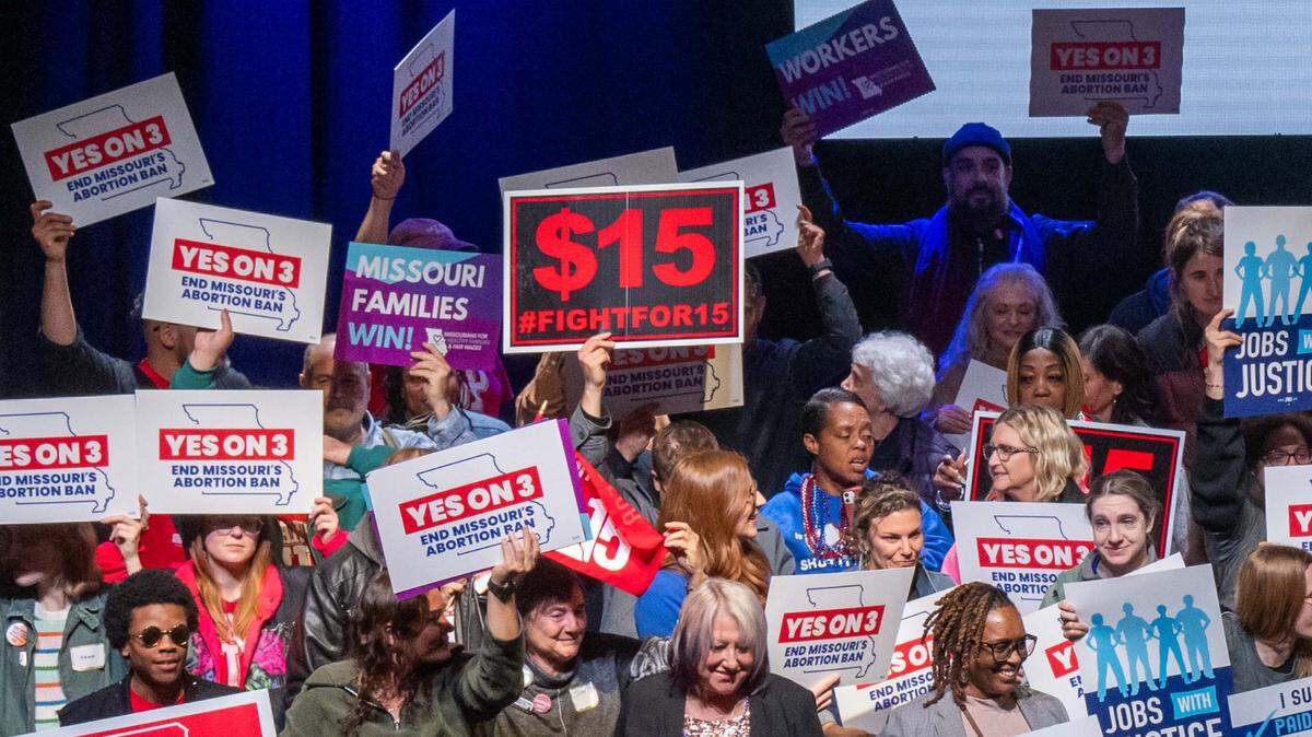 Supporters and organizers of Amendment 3 and Proposition A celebrate the results of the election at a watch party at Uptown Theater in Kansas City on Election Day, Tuesday, Nov. 5, 2024.