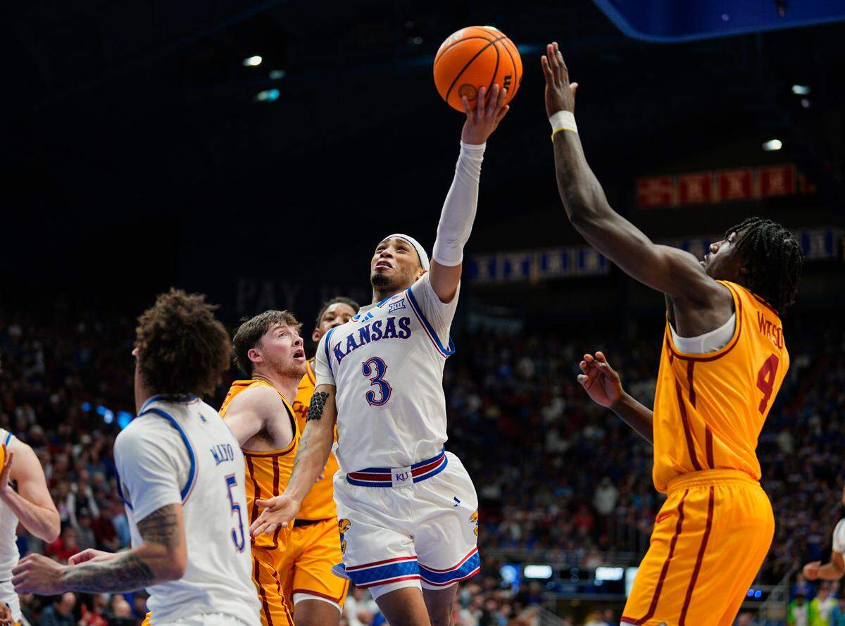 Kansas Jayhawks guard Dajuan Harris Jr. (No. 3) puts up a shot against the Iowa State Cyclones during a college basketball game at Allen Fieldhouse in Lawrence, Kansas, on Monday, Feb. 3, 2025.