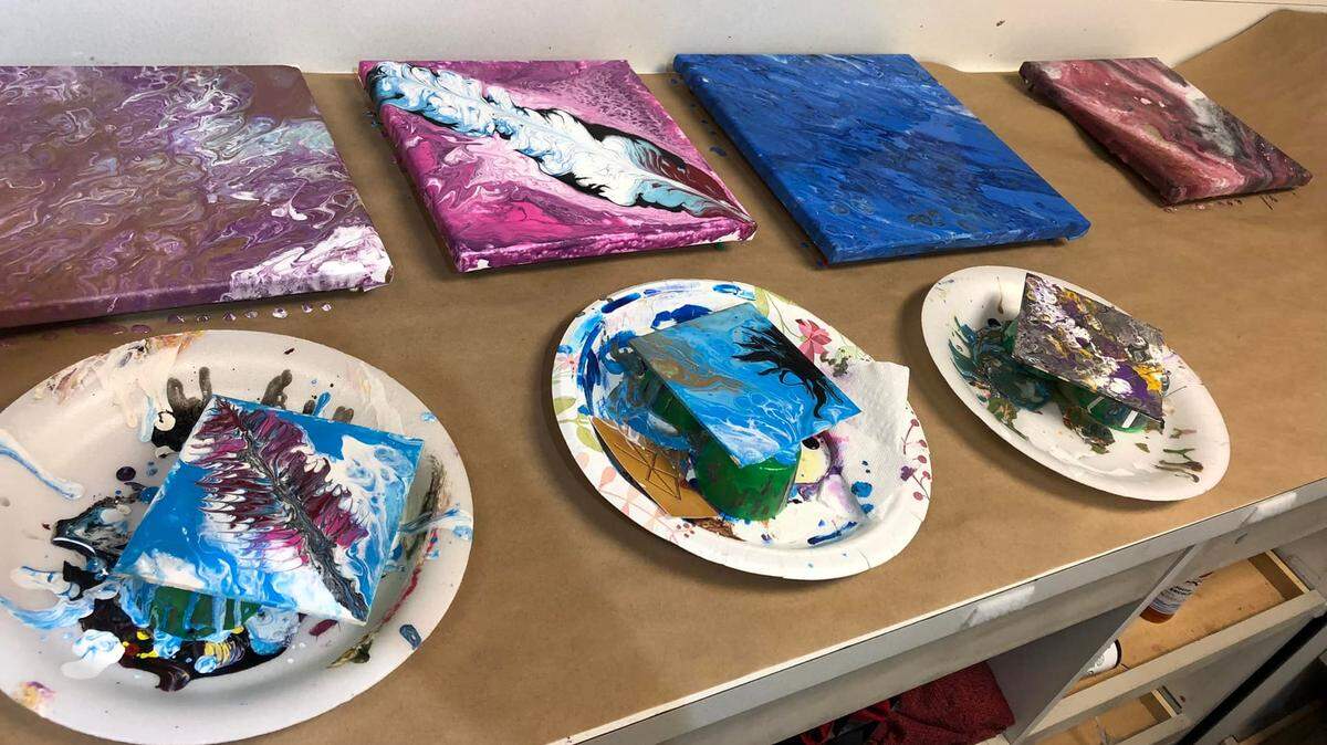 Although the small, with just 32 members, Olathe Visual Group’s programs are open to everyone. This group was experimenting with paint.