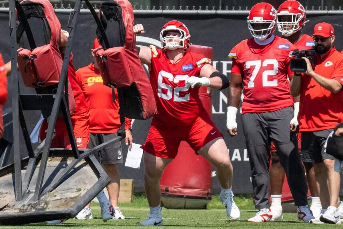 Kansas City Chiefs offensive lineman Josh Thompson punches a sled during drills on the first day of minicamp, Tuesday, June 9, 2026, in Kansas City.