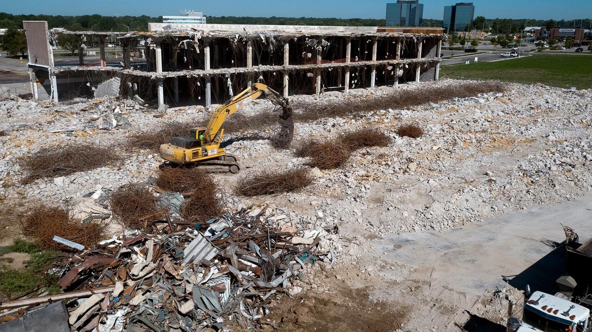 The last remaining piece of the Metcalf South Shopping Center came down as the former Sears building that was part of the mall near 97th Street and Metcalf Avenue in Overland Park was demolished to make room for redevelopment. Crews were busy Aug. 31, 2022, removing rubble.