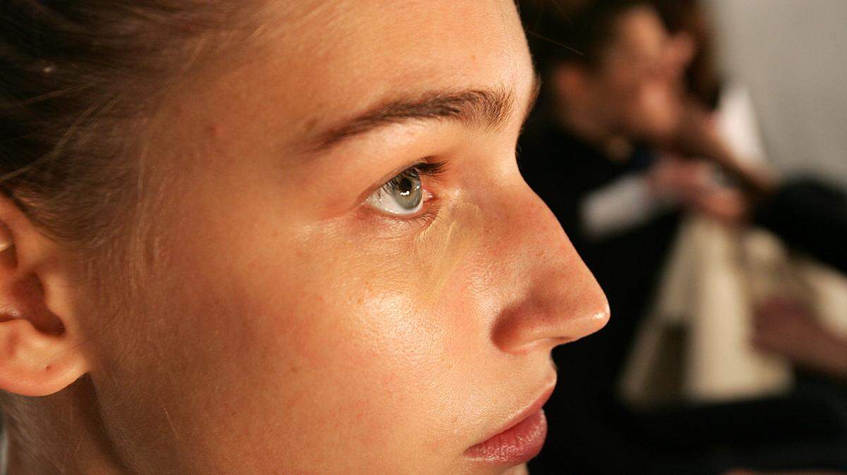 Under eye concealer being applied.