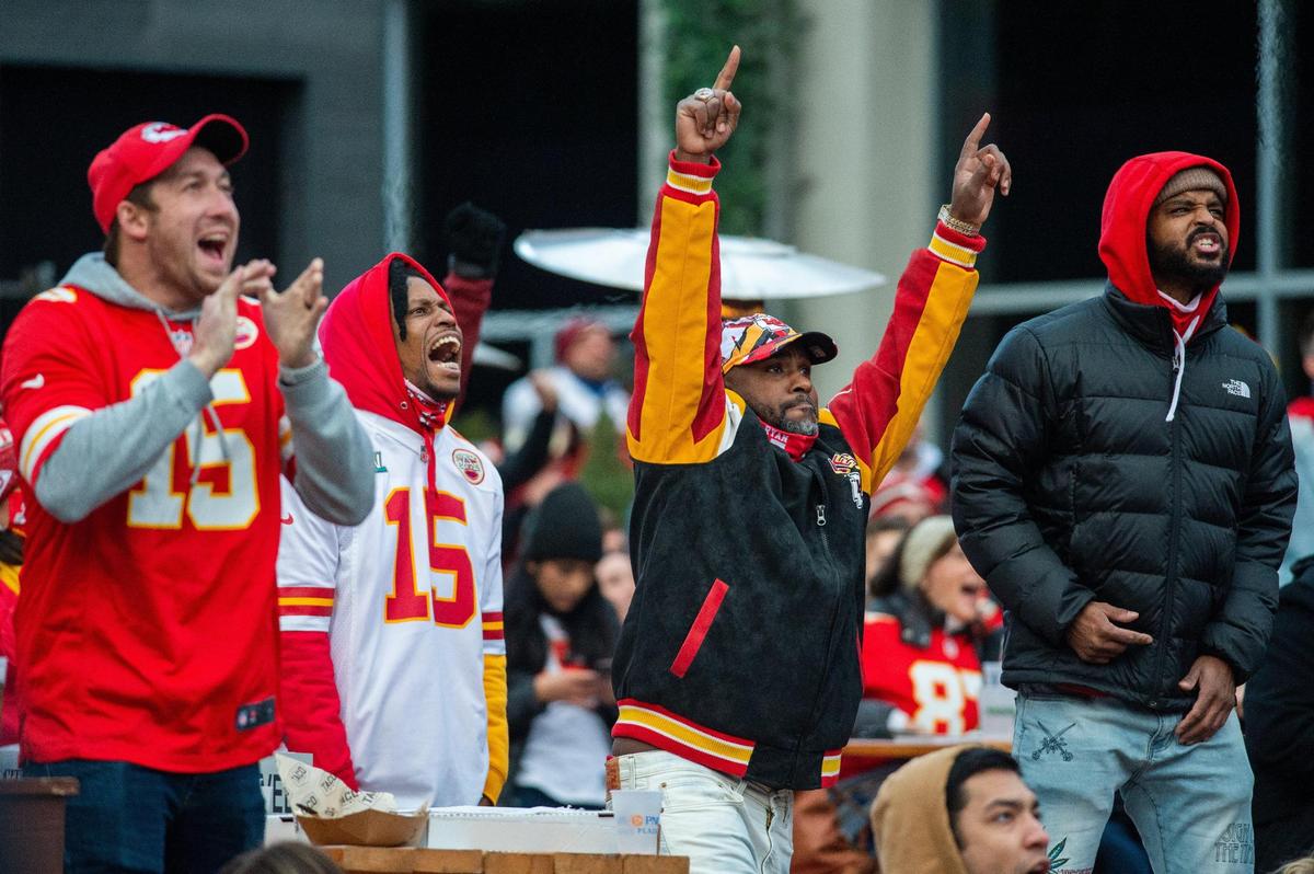 Fans cheer at KC Live! at the Power and Light District as the Chiefs played against the Cleveland Browns in the AFC playoff game Sunday, Jan. 17, 2021.