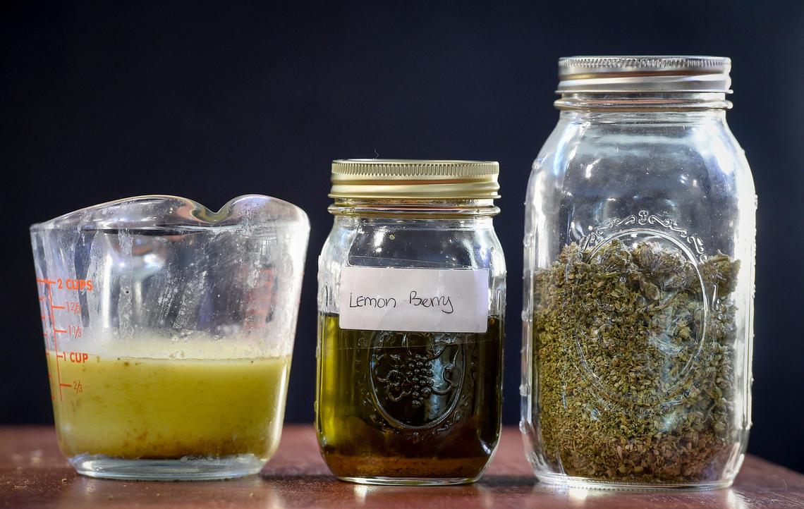 Patrice Harris of suburban Kansas City, who has both her medical marijuana and cultivator ID cards, uses marijuana buds, like the ones in the jar on the right, to make cannabis butter and tinctures. She cooks with the cannabis butter, using it in foods such as brownies and Rice Krispies treats.