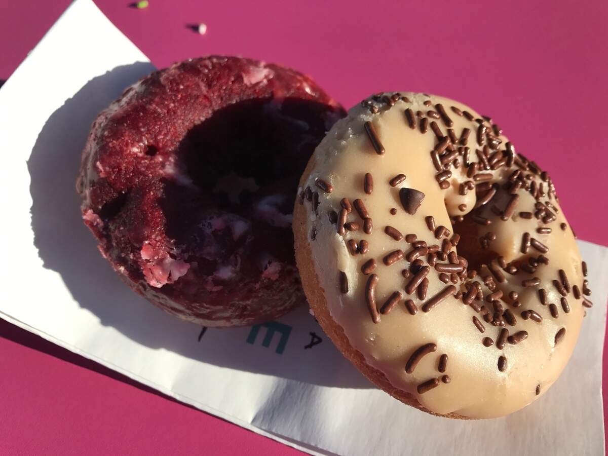 DOP Donut’s cherry chip and peanut butter with chocolate sprinkles.