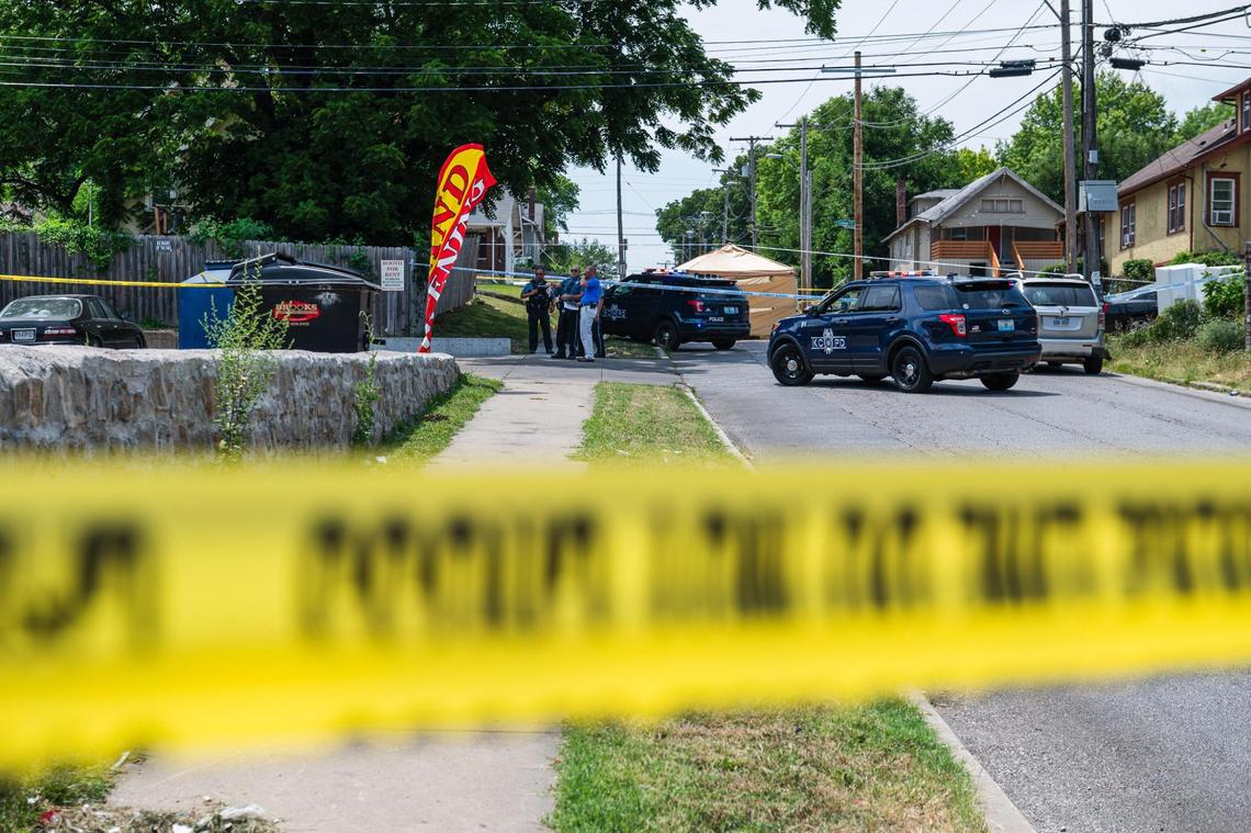 Police officers block off the street to investigate a fatal shooting that left one person dead near the corner of 43rd Street and College Avenue on Friday, June 30, 2023, in Kansas City. The fatal shooting occurred near Klymax Lounge where another deadly shooting occurred in May leaving three people dead and two injured.