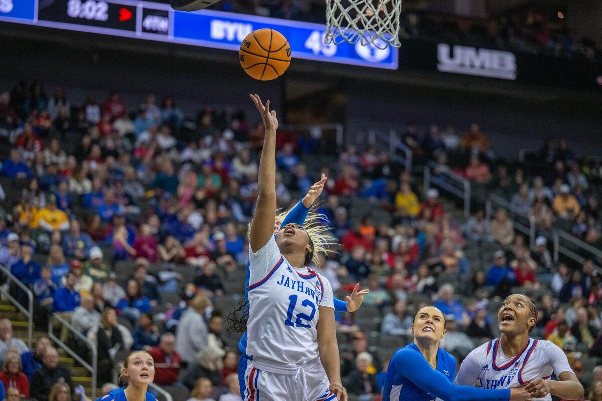 Kansas Jayhawks guard S’Mya Nichols (12) makes a basket in the second half during an NCAA women’s basketball game against the BYU Cougars in the Big 12 Tournament at T-Mobile Center on Friday, March 8, 2024, in Kansas City.