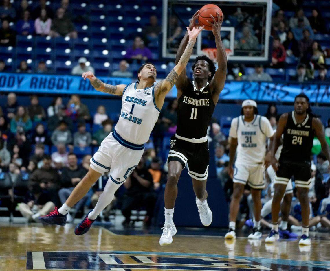 St. Bonaventure guard Melvin Council Jr. grabs a pass over Rhode Island’s Sebastian Thomas during a 2025 game.