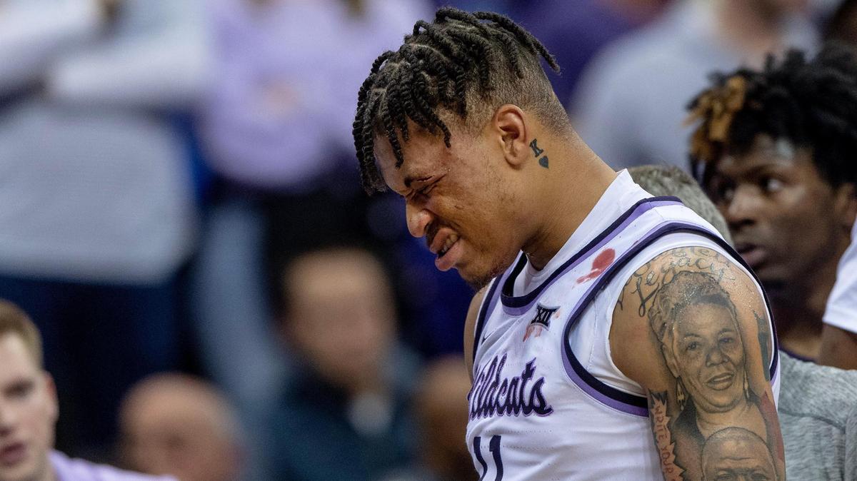 Kansas State forward Keyontae Johnson (11) reacts after getting hit in the eyebrow during a game against TCU in the second round of the Big 12 Conference tournament Thursday, March 9, 2023, in Kansas City.