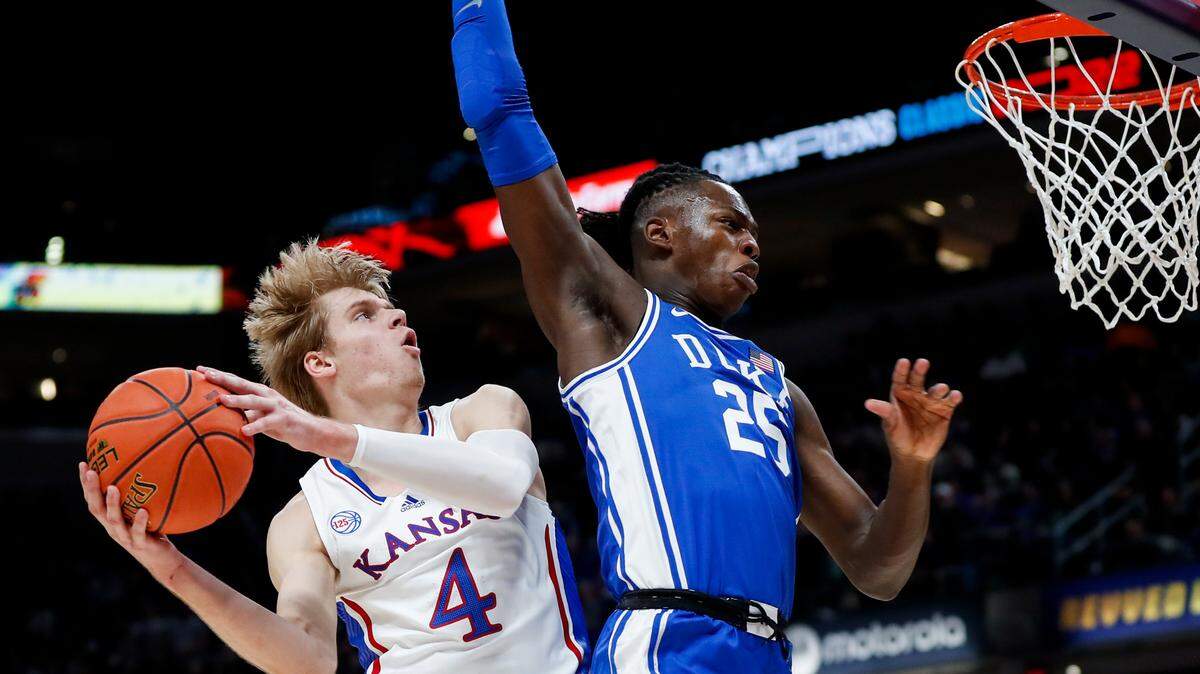 Kansas Jayhawks guard Gradey Dick (4) drives to the basket against Duke Blue Devils forward Mark Mitchell (25) during the State Farm Champions Classic at Gainbridge Fieldhouse in Indianapolis, In., Tuesday, November 15, 2022.