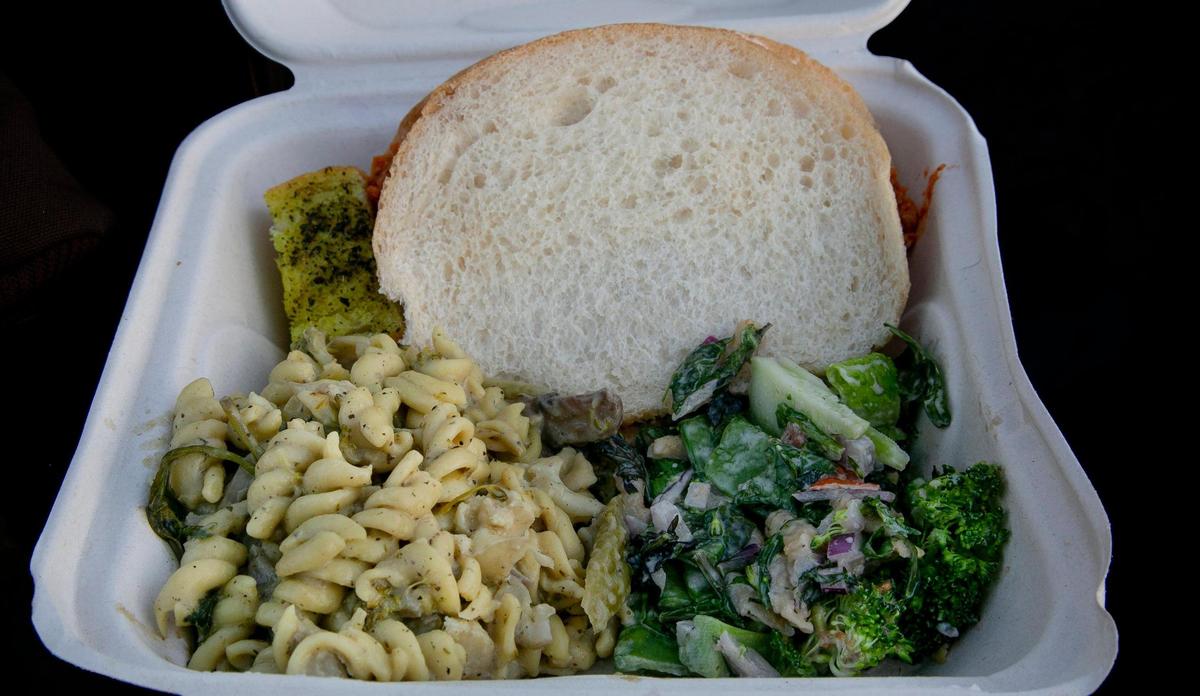 Volunteers for the Food Not Bombs organization served food to those in need Sunday, November 29, 2022. They serve food every Sunday from 4-5 p.m. at the corner of Independence and Monroe in Kansas City. This weeks meal was A vegan sloppy Joe, cheesy pasta and broccoli salad.