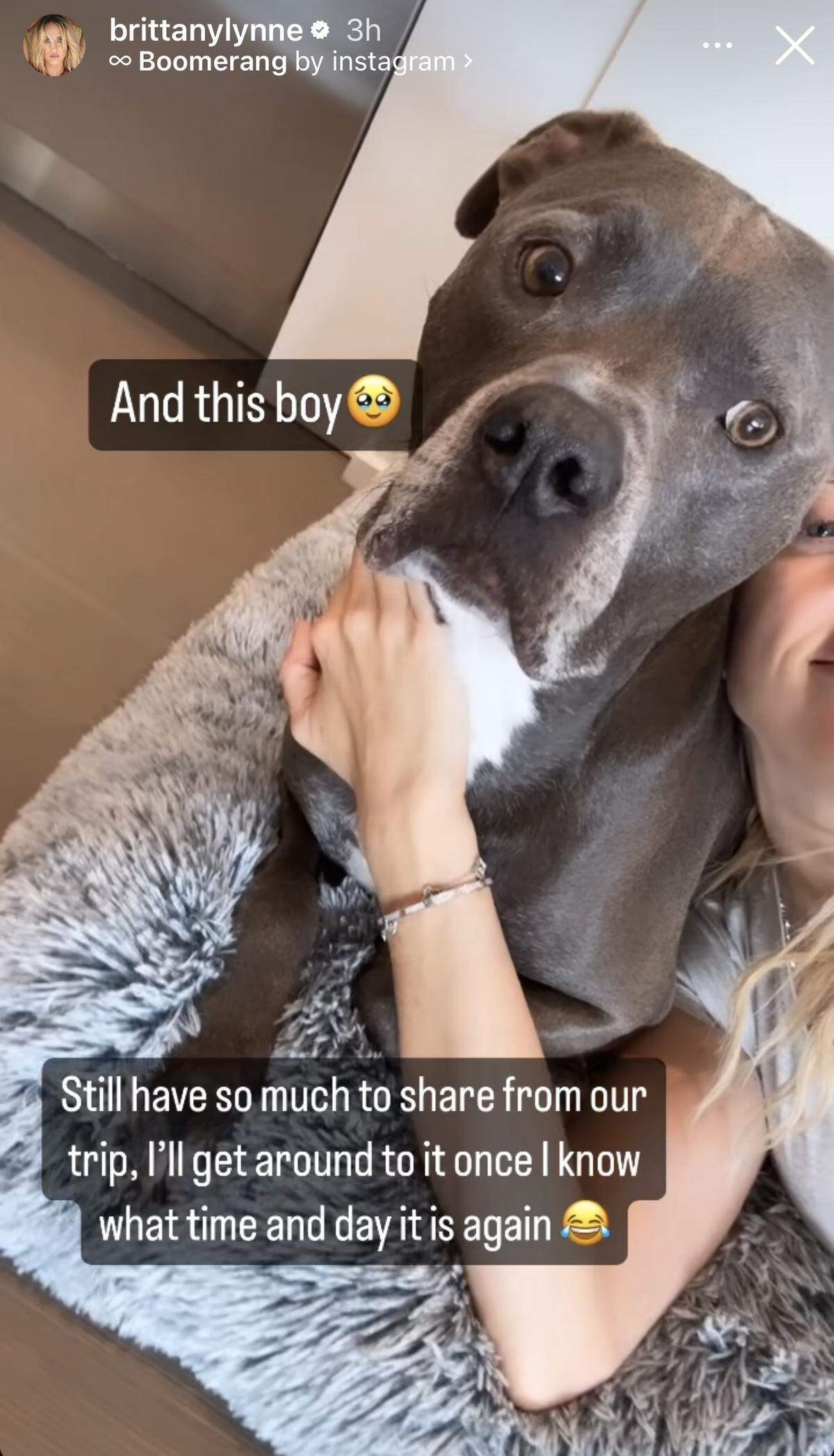 Brittany Mahomes cuddled up with the dogs after the family’s European vacation.