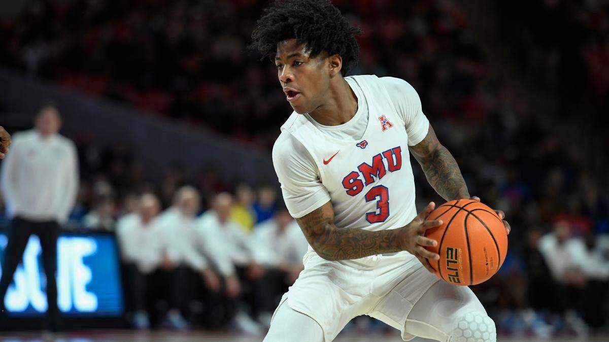 SMU guard Kendric Davis (3) controls the ball against Houston during the first half of an NCAA college basketball game Sunday, Feb. 27, 2022, in Houston. (AP Photo/Justin Rex)