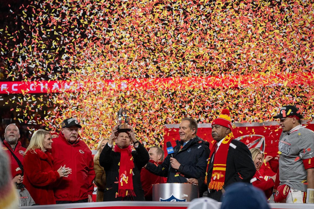 Clark Hunt hoists the Lamar Hunt trophy after the as the Kansas City Chiefs celebrate the teams’ 32-29 win over the Buffalo Bills to claim the AFC Championship on Jan. 26, 2025, at GEHA Field at Arrowhead Stadium.
