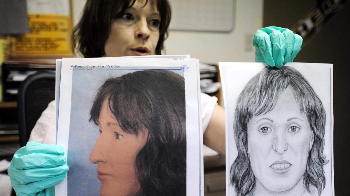 Detective Lorie Howard, MacDonald County Sheriff’s Department, holds up a forensic artist’s approximation (left), based on CT scans of the skull and mandable as well as dental records, and a forensic sketch of a Jane Doe she has dubbed “Grace,” April 12, 2011, at the department’s Pineville office.