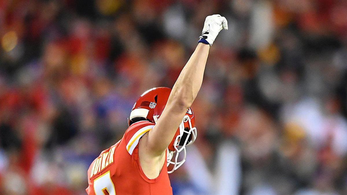 Kansas City Chiefs kicker Harrison Butker celebrates after kicking a 49-yard field goal to tie the game with the Buffalo Bills to send it into overtime Sunday, January 23, 2022, at Arrowhead Stadium.