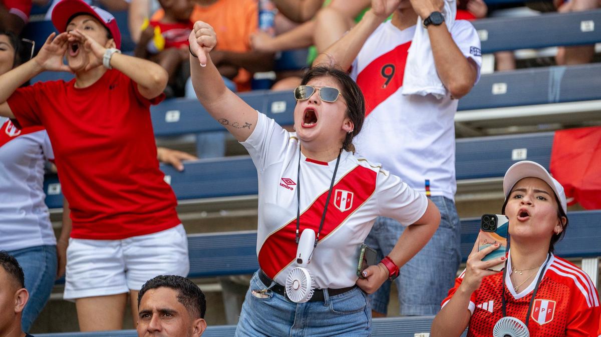 Peru fans react to Canada defender Alistair Johnston’s actions during the first half of a Copa America match at Children’s Mercy Park on Tuesday, June 25, 2024, in Kansas City, Kansas.