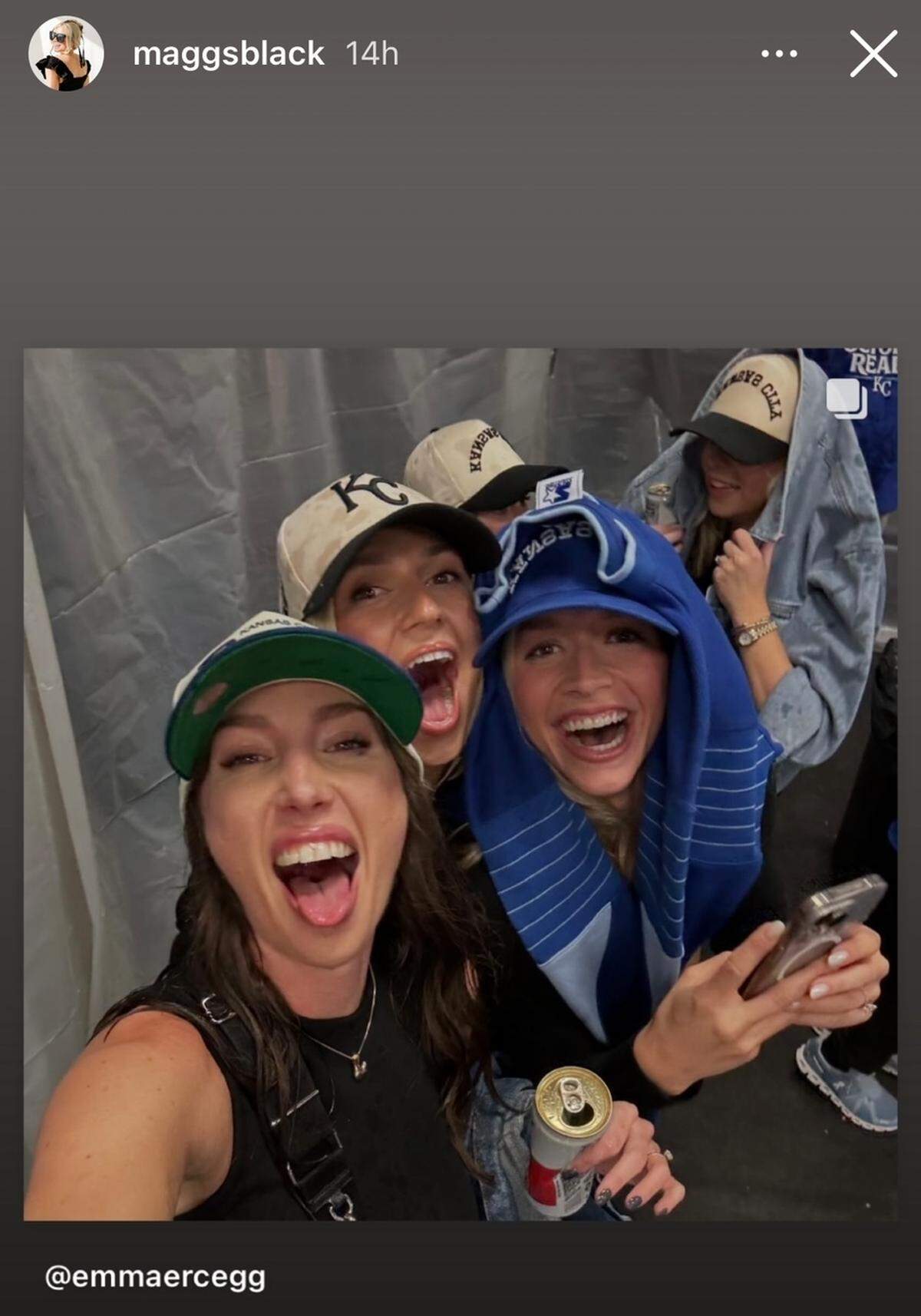 The girls were having some fun celebrating the fact that the boys are playing some ball.