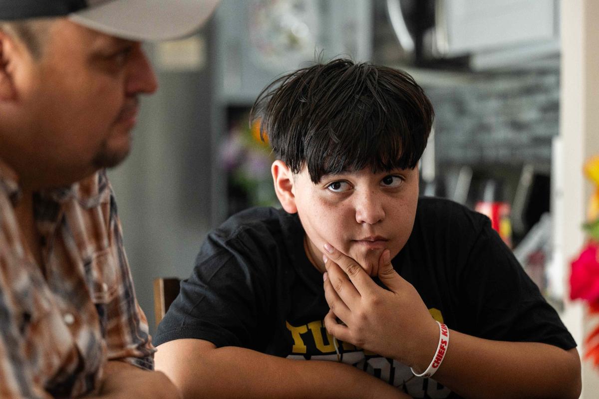Samuel Arellano at his home on Aug 28, 2024. Samuel was struck by gunfire at the Chiefs Super Bowl Celebration at Union Station. Samuel is an avid Chiefs fan and after the shooting, he received a signed football from Chiefs QB Patrick Mahomes. (082824)