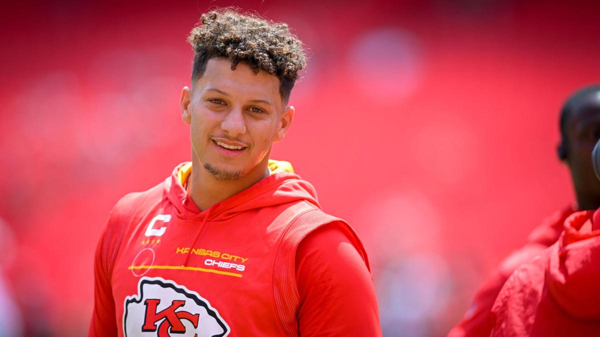 Kansas City Chiefs quarterback Patrick Mahomes smiled after he warned up before the start of the game against the Washington Commanders on Saturday, Aug. 20, 2022, at Arrowhead Stadium in Kansas City.